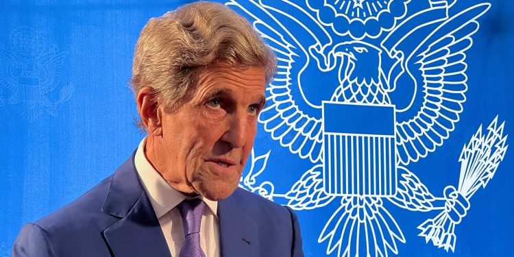 John Kerry says climate threat calls for wartime urgency: ‘Turn factories into solar panel producers’