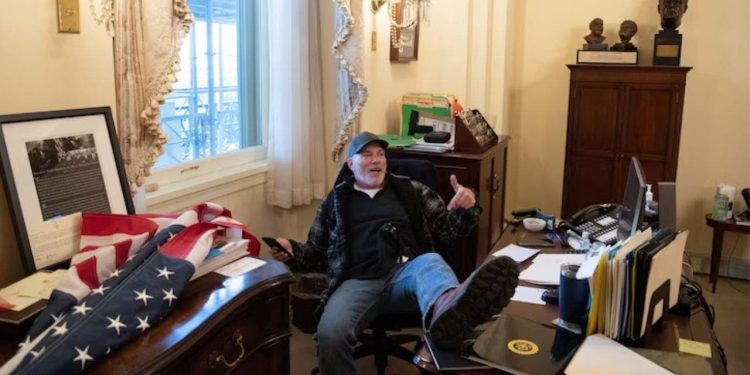 Capitol rioter who put feet on Pelosi’s desk regrets his ‘crass’ actions that brought ‘misery’ to family