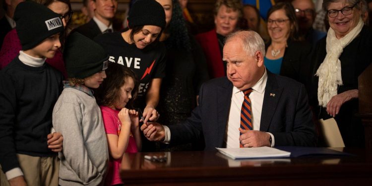 Minnesota Gov. Walz gives tax relief bill 1st signature of legislative session
