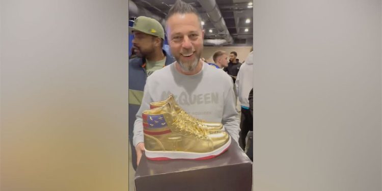 CEO wins autographed golden Donald Trump sneakers after $9K bid
